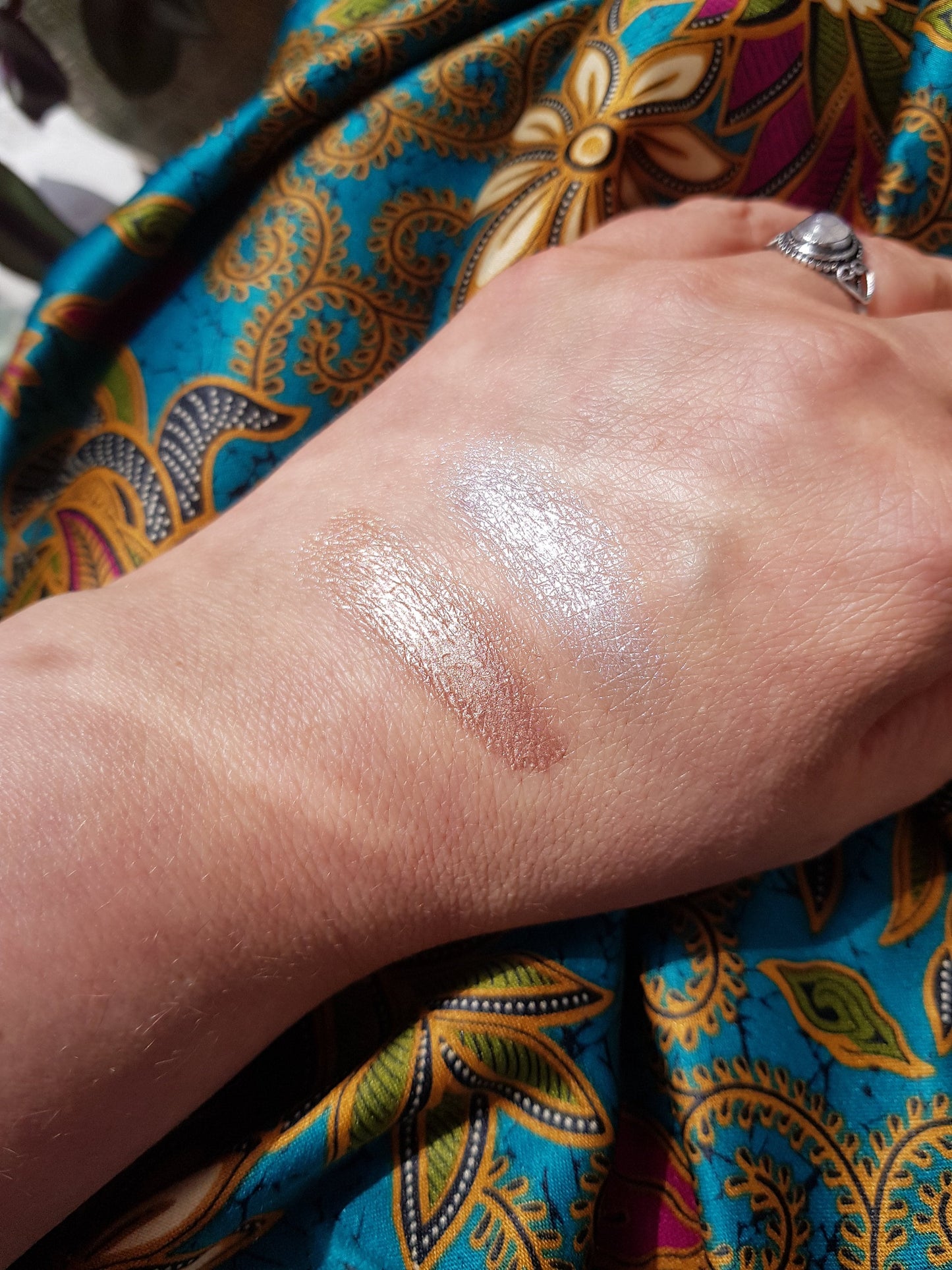 Aura Shimmer Balm.