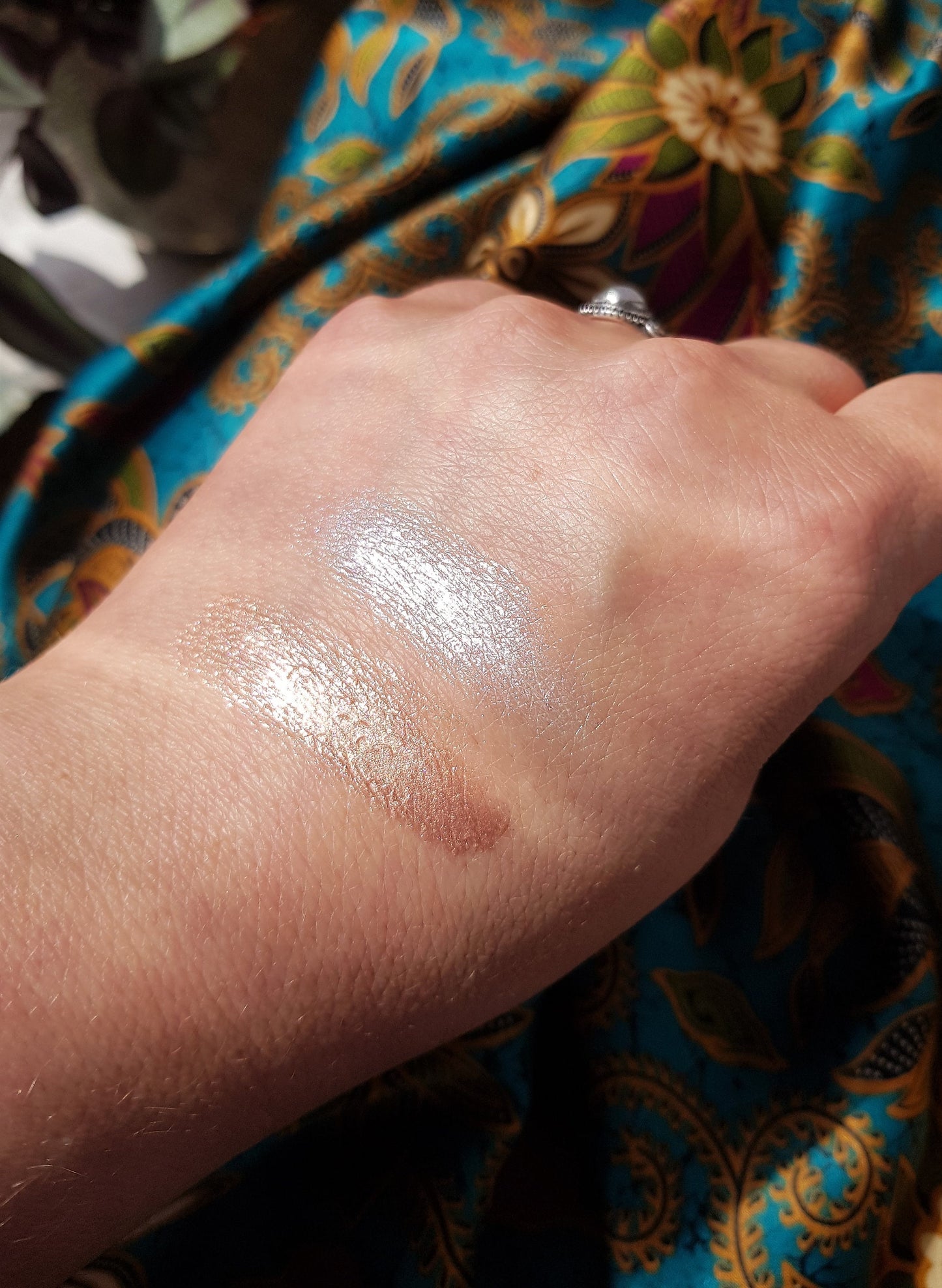 Aura Shimmer Balm.
